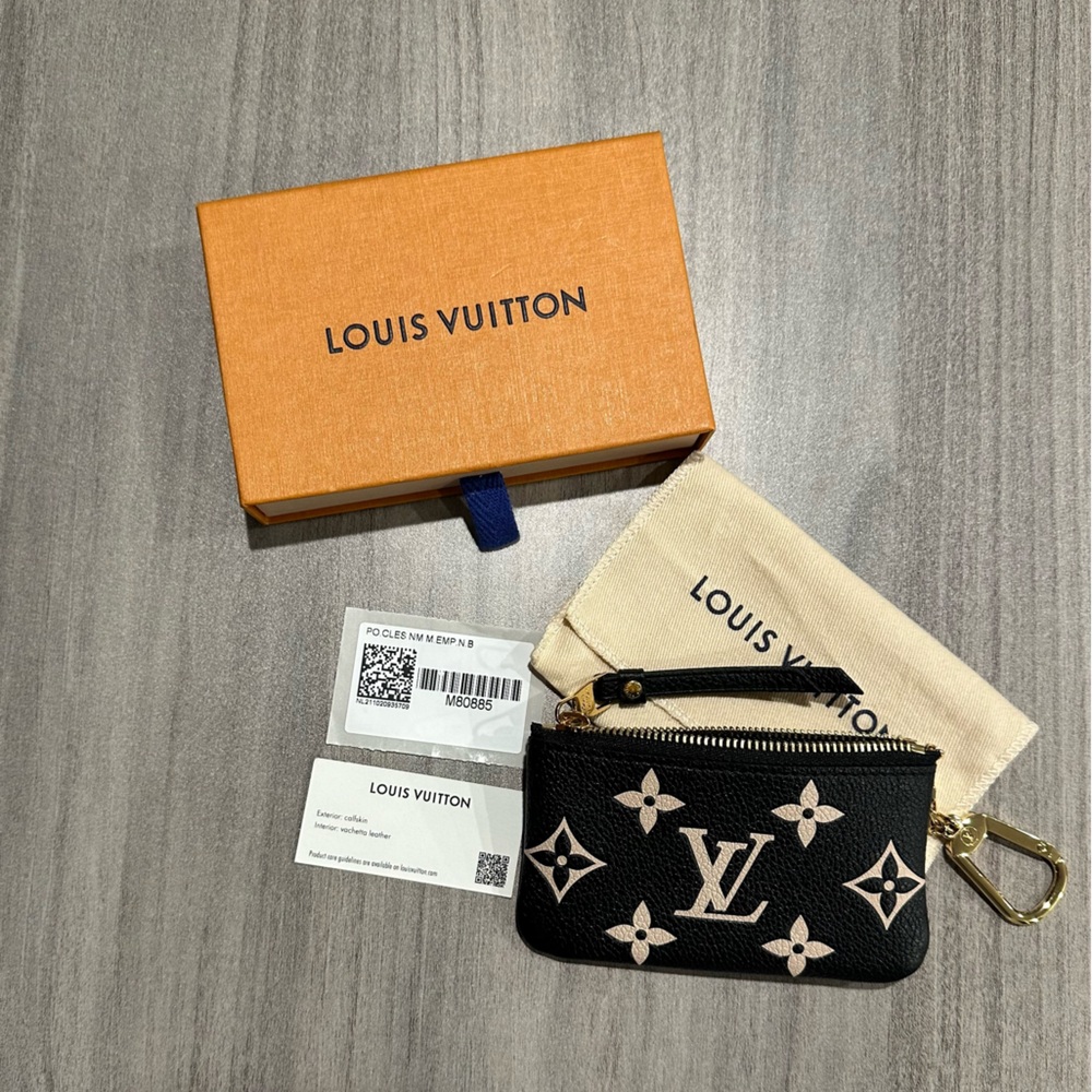 Louis Vuitton Bicolor Monogram Empreinte Black/Beige Leather Key Pouch.